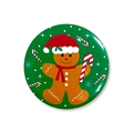 Christmas tinplate badge featuring a cute gingerbread man on a green festive background - Christmas Badge 8-Gingerbread Man