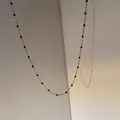 Minimalist gold-plated stainless steel thin necklace featuring elegant black bead accents - Black Enamel Style (D1144)