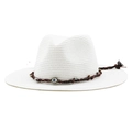 Close-up of white straw sun hat with brown leather band and Evil Eye pendant - M (56-58cm) / White