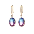 Elegant gold drop earrings with oval gradient gemstone and zircon accents on a white background - Blue + Purple