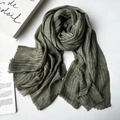 Moss green pleated scarf with vertical texture and fringe edges on a white background - Army Green