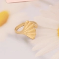 Detailed view of a gold-plated ginkgo leaf open ring on a soft floral background - Ginkgo Leaf Design (11#)