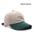 Retro corduroy baseball cap featuring a beige crown and contrast dark green brim detail - Dark Green