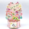 3D Pop-up Kindertagskarte mit einem bunten Blumenkorb und Schmetterlingen in einer Box - Traumhafter Garten