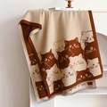 Detail of soft beige and brown cat pattern shawl draped on a minimalist white shelf - 185cmx65cm / Dark Brown