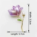 Elegant purple magnolia flower brooch with a white pearl in a golden finish - Magnolia Purple