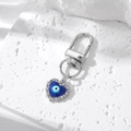 Detail of silver heart evil eye keychain with blue enamel and sparkling rhinestones - Silver Enamel Heart Evil Eye