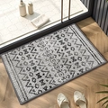 Gray and white chenille bath mat with geometric pattern on wooden floor entry - Herati Pattern