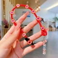 Red heart-patterned mobile phone strap with crystal beads and clip in hand - Straight Braid / Red Heart
