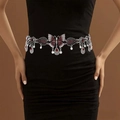 Detailed shot of silver butterfly waist chain with red gemstones on a black dress - Red Diamond Butterfly / Silver / 17.5