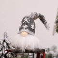 Gnome plush with grey snowflake knit hat and white beard on a red vintage metal sled - Gray Forest Man Doll With Light (E-DD02)
