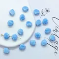 Light blue shell shaped ceramic beads for DIY jewelry making with polished glaze finish - 12mm / Lake Blue