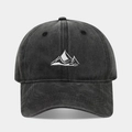 Detailed macro view of white mountain peak embroidery on washed cotton baseball cap - Black