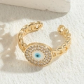 Bague luxe œil protecteur plaqué or avec zircons brillants et design chaîne - Blanc