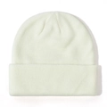 Close-up of the soft ribbed knit texture on a classic cream-white baby beanie hat. - Soft White