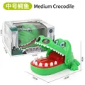 Classic green bite hand crocodile game toy with product and packaging dimensions - Medium Crocodile (Window Box)