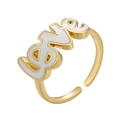 Detail of gold-plated LOVE ring featuring white enamel script and stylized treble clef L - White