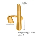 Detail view of a gold stainless steel asymmetric ring with size and weight specs - US 7 / Gold