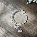 Exquisite handmade beaded bracelet with purple beads and a pink diamond butterfly charm - S024-rhinestone Butterfly Light Purple Bracelet With Bursting Flowers And Diamonds #sz206