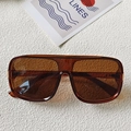 Classic aviator sunglasses featuring amber resin frames and tinted brown UV lenses - Transparent Dark Tea
