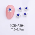 Macro detail of 7.5mm star nail charms with blue rhinestones on silver metal base - Silver Base With Blue Rhinestone Pentagram (A294)