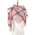 Women's pink plaid tassel scarf with loop yarn texture on a mannequin display - Pink Plaid