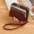 Vintage dark brown faux leather coin purse with metal clasp and wrist strap detail - Coffee