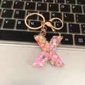 Fashionable resin letter X keychain with colorful heart sequins and gold metal ring - Letter X