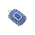 Macro shot of silver pendant with rectangular blue center stone and pave setting - Platinum Sea Blue Zirconia