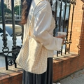 Detail shot of yellow checkered canvas tote bag showing side profile and shoulder strap - Beige Plaid