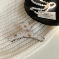 Floral acrylic hair claw clip in vintage orange and yellow pattern with black teeth - Hanger Shape / Beige Floral