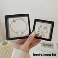 Black PE film floating jewelry display box holding clover bracelet and earrings - Floating Display Box / 7x7x2cm / Black