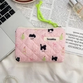 Detail of floral quilted pouch with cat and pear patterns and green zipper pull - Black Cat Pear