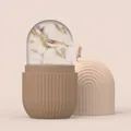Brown silicone ice roller face massager with non-slip base and transparent ice mold - Striped Model Brown