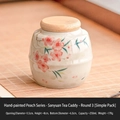 Mini ceramic tea canister with hand-painted peach blossoms and bamboo airtight lid - Peach Blossom Series - Round Jar