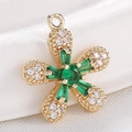 Golden flower pendant with emerald green center stone and clear zircon accents - S116-13 Gold Green Zircon Diamond Flower