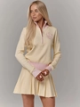 Women's 2-piece knit sweater set with half-zip top and pleated skirt in beige and pink - S / Light Yellow