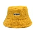 Detail of yellow sherpa fleece bucket hat featuring embroidered HaiTalentoM logo patch - Yellow