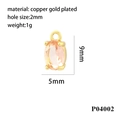 Macro detail of 18K gold plated copper oval pendant with orange zircon inlay for jewelry DIY - Gold/Orange Zirconia