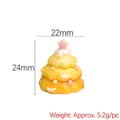 Mini yellow resin Christmas tree figurine with pink star topper and polka dot details - Gradient Orange