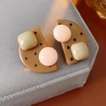Detailed view of cookie-shaped resin earrings in brown and pink on velvet - 925 Sterling Silver Earring Post - Coffee