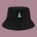 Close-up of small green dinosaur embroidery on a black cotton bucket hat - One Size / Black