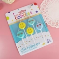 Set of 5 emoji-faced birthday candles with smiley faces on a pink decorative background - Multicolor Smiley Style / 5 Pieces