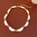 Detail of white enamel and gold metal link necklace with lobster clasp on leather - 72# Necklace Enamel Cross Link Variant