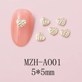 Detail of 5x5mm gold heart nail art charms with quilted texture on pink background - Light Gold Stereoscopic Quilted Texture Heart (A001)