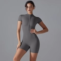 Detail of dark grey yoga romper with front zipper, stand collar, and high-stretch fabric - S / Dark Gray