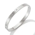 Polished silver stainless steel bangle with engraved starburst and zircon inlay - Silver Tone Star Motif Bangle (PAS822)