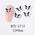 Primer plano de 5 dijes de mariposa 3D negros para uñas con marcos de plata aleada - Estilo de Borde Plateado Negro (A712)