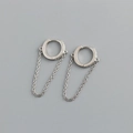 Detail of silver hoop earrings with clear cubic zirconia and long chain dangle pendant - Chain Tassel Earrings (S-E1560) / Silver