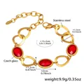 Detail of gold stainless steel chain bracelet with red oval faceted Czech glass stones - Gold Red (TXE283)